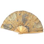 A vintage oversized folding wooden fan.