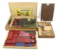 An assortment of Meccano sets of various ages and a boxed wooden building set