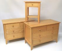 Two contemporary chests of drawers and a similar bedside table.