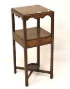 An early 20th century square pot stand.
