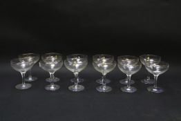 A collection of twelve Babycham glasses from the 1950s and later