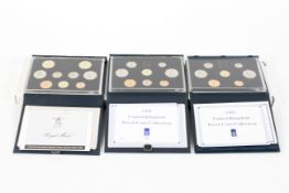 Three Royal Mint proof coin collections, for the years 1989, 1990, 1991.