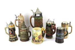 An assortment of German stoneware steins.