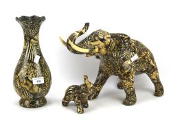 Two Collage models of elephants and a vase. The largest H29.