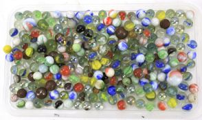 A bag of opaque and translucent marbles of various colours and sizes