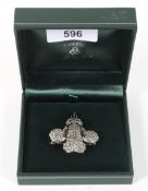 A marcasite and silver emblem fluer-de- lys Surry Cricket Club emblem1965