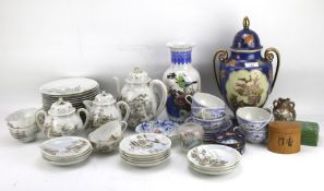 An assortment of Japanese and oriental style ceramics, glass and metalware.