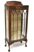 An early 20th century oak display cabinet.