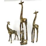 Four contemporary Collage safari models of giraffes.