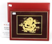 A Chinese gold plated dragon.