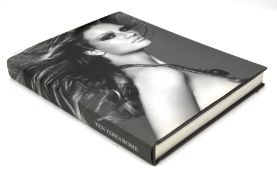 Ten Times Rosie, a photographic art book of the model Rosie Huntington-Whitely,