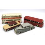 Four Dinky diecast vehicles.