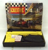 A vintage Tri-ang scalextric set, in original box.