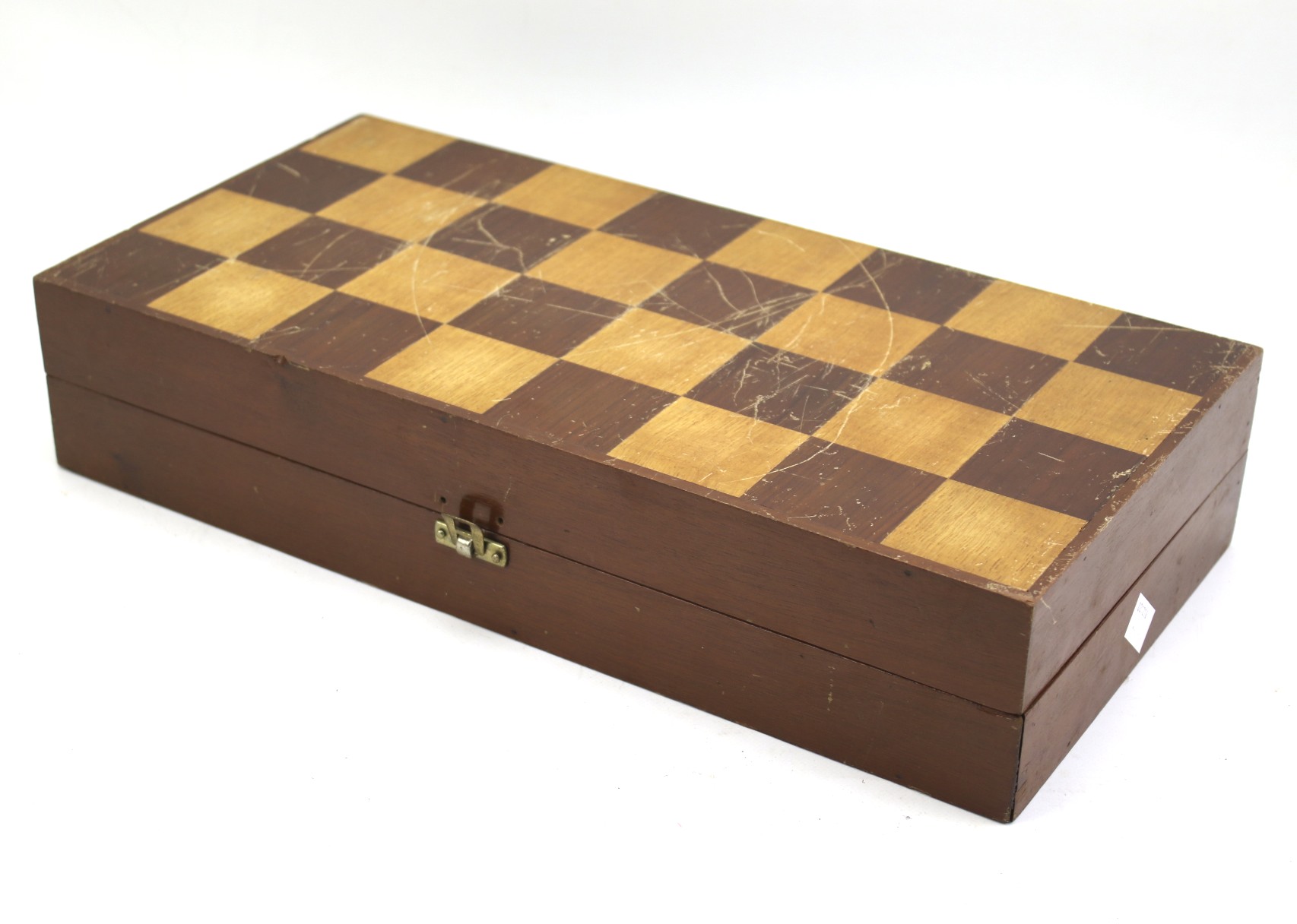 A boxed white and red stained bone chess set.