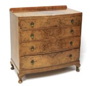 A 1930s burr walnut chest of drawers.