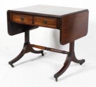 An early 19th century mahogany Pembroke table.