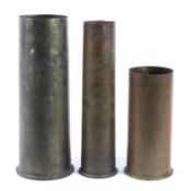 Three large shell cases