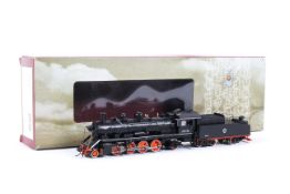 A boxed Chinese OO gauge CS00201 S7 steam locomotive 1742 and tender.