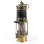 A brass Thomas & Williams Welsh miners lamp.