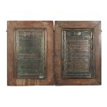 A pair of copper honours boards.