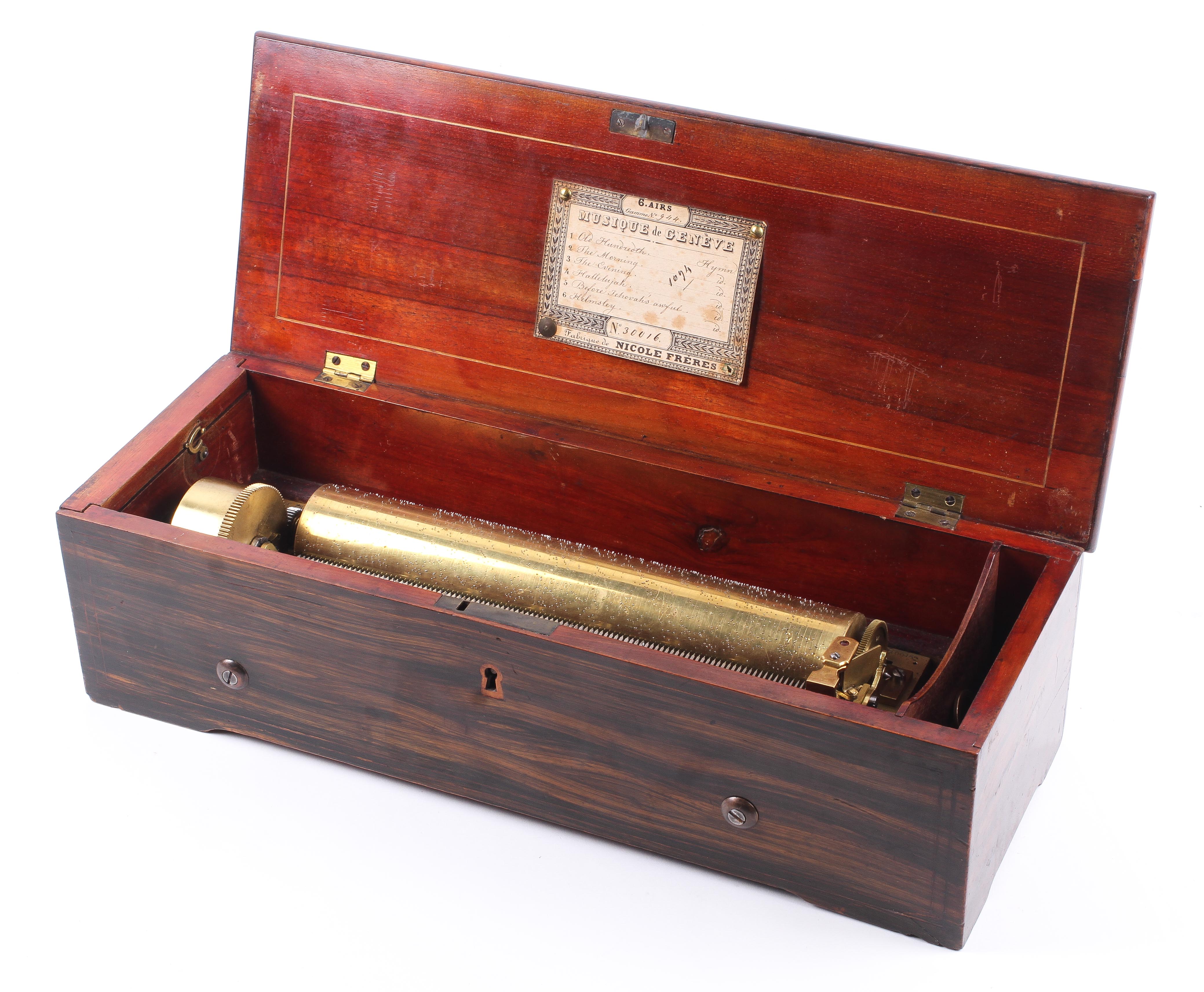 A late 19th century Swiss Nicole Freres rosewood cylinder musical box. With 27.