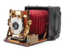 A Sanderson quarter plate field camera.