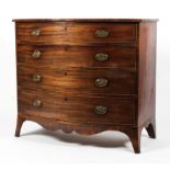 An early 19th century mahogany bow fronted chest.