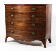 An early 19th century mahogany bow fronted chest.