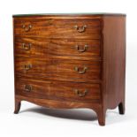 An early 19th century mahogany bow fronted chest.