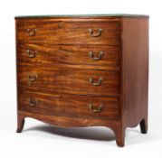 An early 19th century mahogany bow fronted chest.