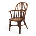 A 19th century elm and fruitwood child's Windsor chair.