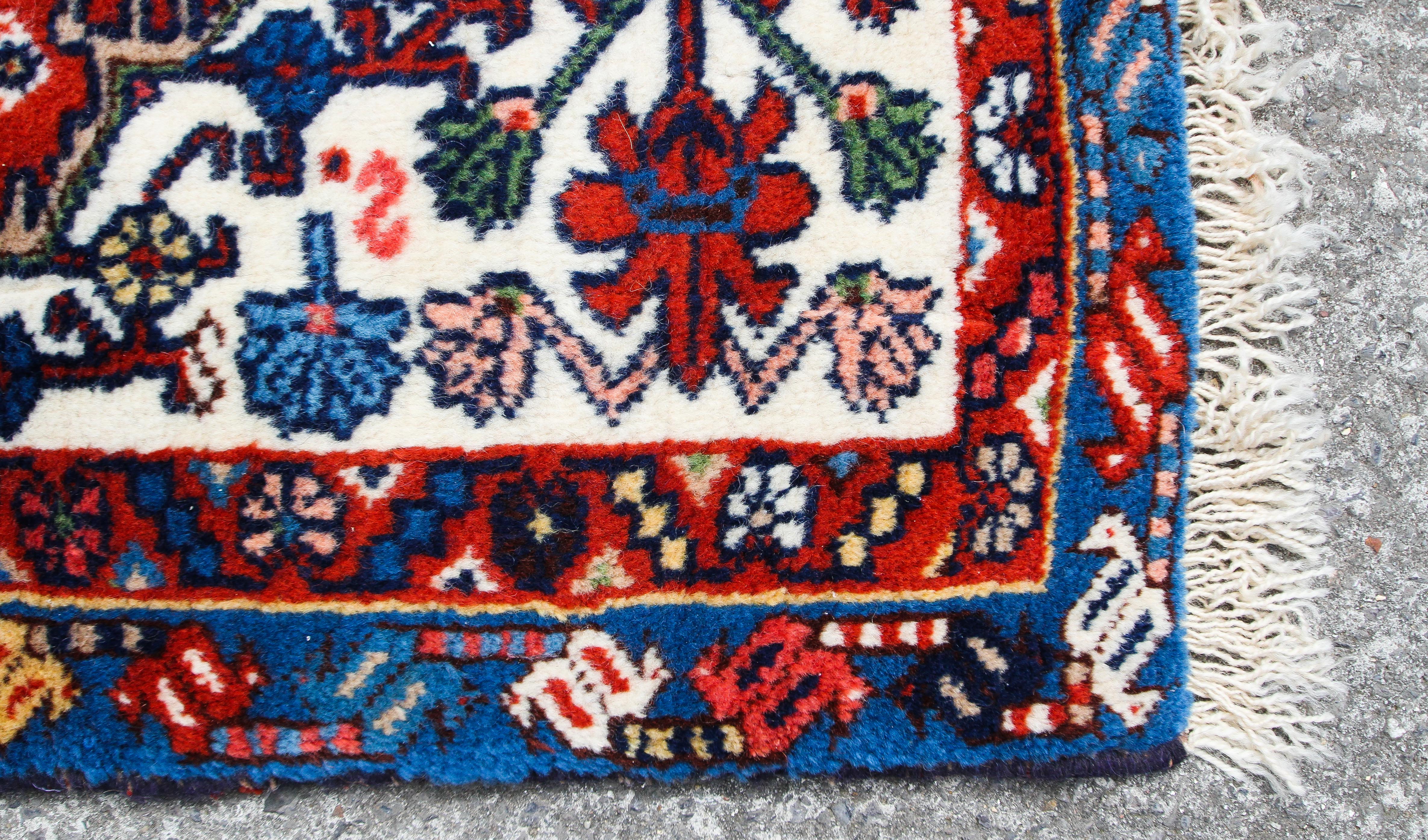 A Tabriz small runner with blue and red medallion on red blue cream ground 352x80cm - Image 2 of 3