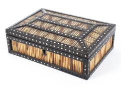 An ebony and porcupine quill box with bone inlay. 23cm 16cm x 8cm.