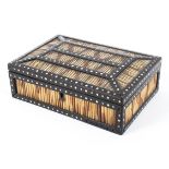 An ebony and porcupine quill box with bone inlay. 23cm 16cm x 8cm.