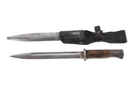 A 1939 German bayonet including scabbard, forge stamped F Herdera Snr.