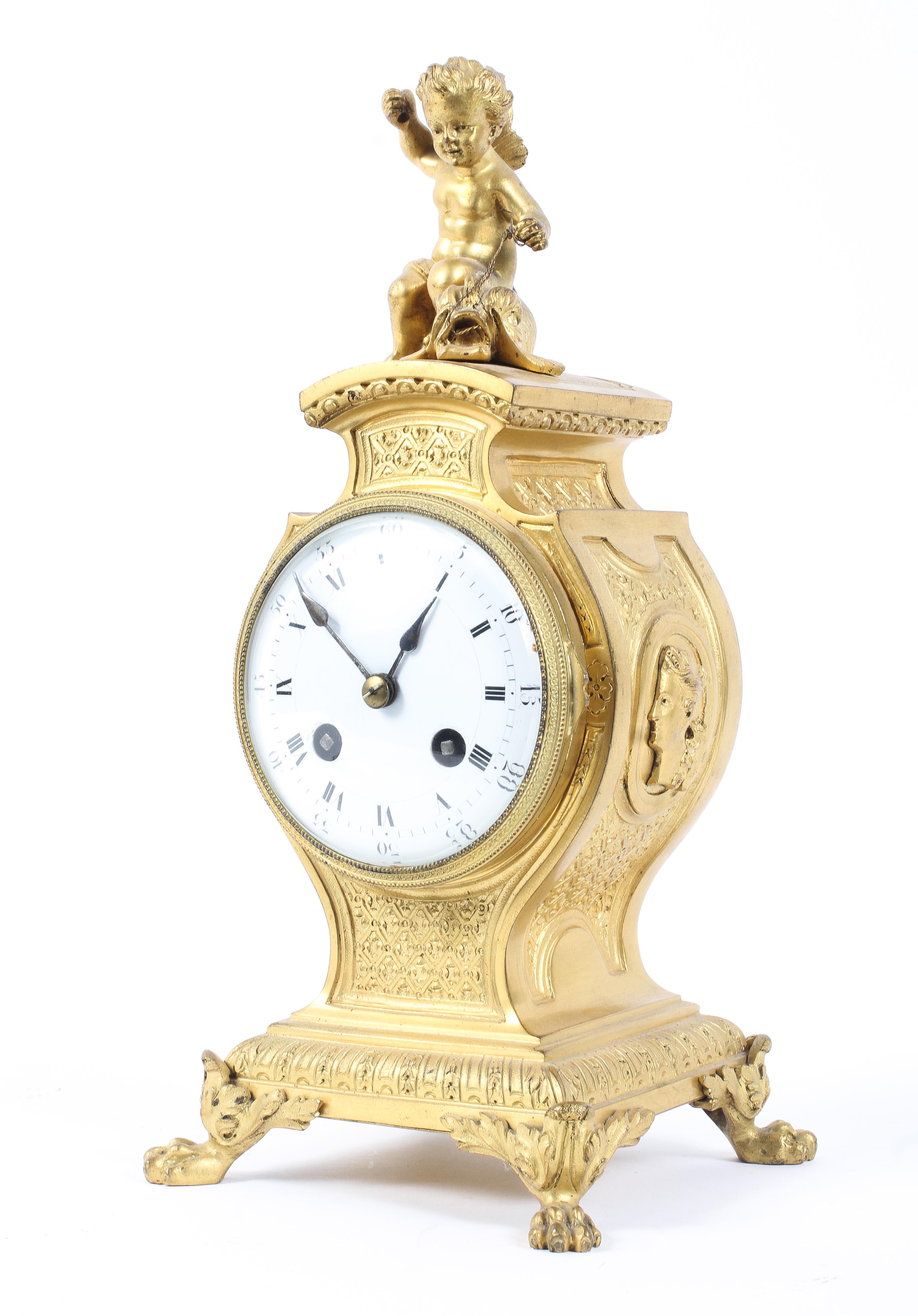 A 19th century gilt metal mantle clock.