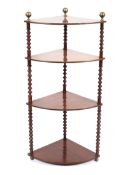 A four tier mahogany what-not.