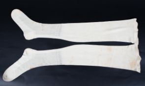 A pair of Queen Victoria's ivory coloured silk stockings.