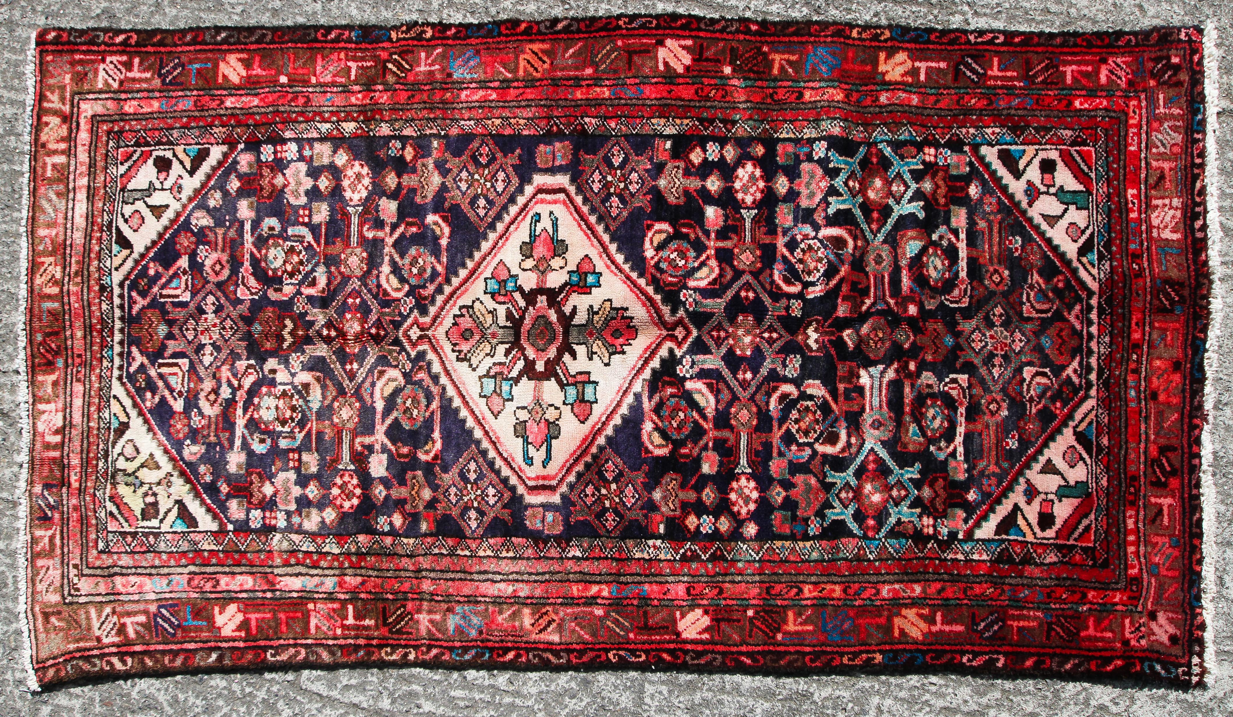 A Quality Hamedan rug with central cream medallion of Persian design in a...