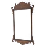 A Georgian style walnut pier mirror.