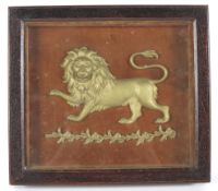 A late 19th century oak cased carved giltwood lion.