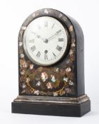 A Victorian Japanned and mother of pearl inlaid mantel clock.