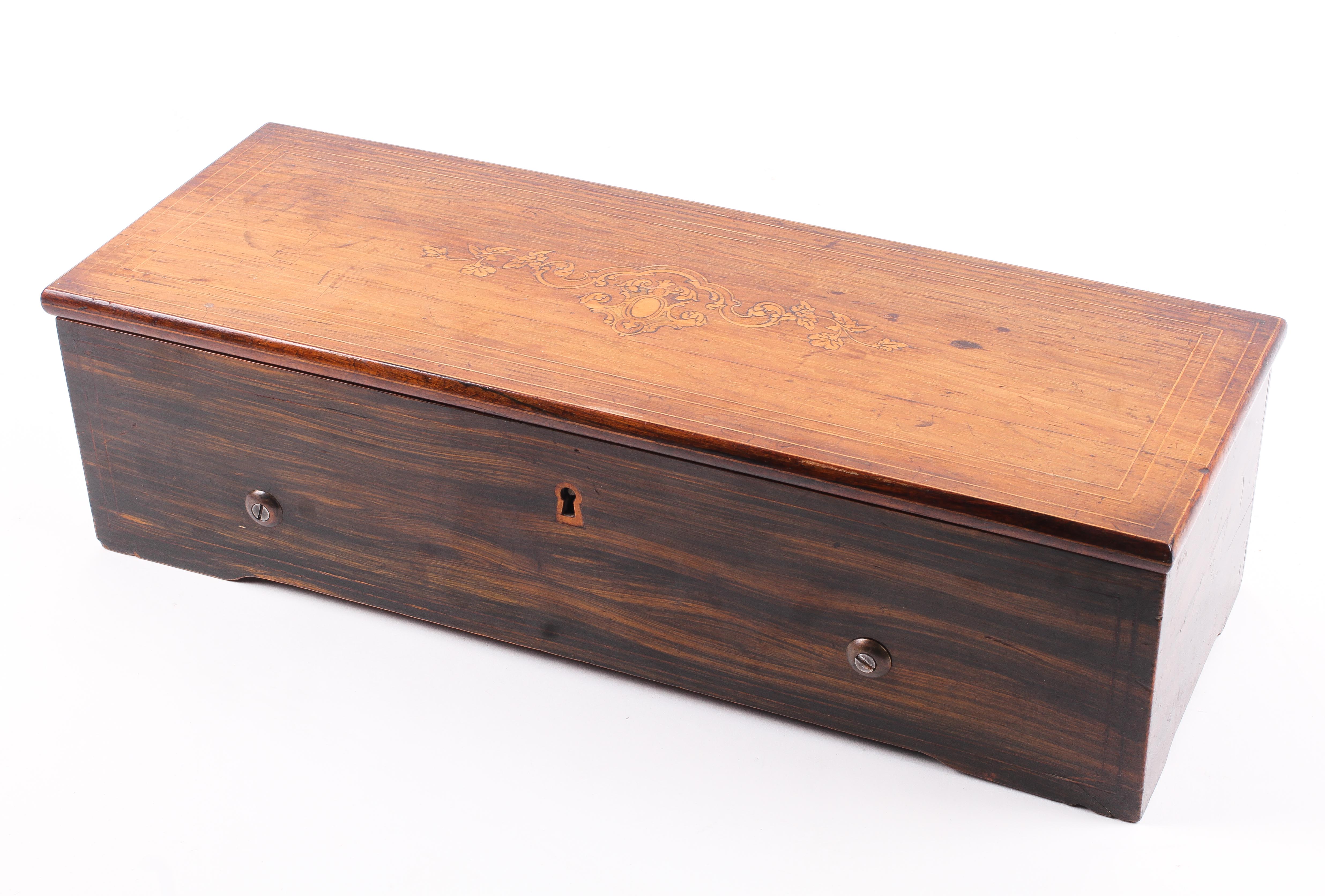 A late 19th century Swiss Nicole Freres rosewood cylinder musical box. With 27. - Image 4 of 4