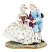 A late 19th century Meissen figure group of a gallant and companion.