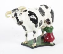 An early 19th Century Staffordshire pearlware cow creamer,