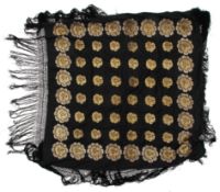 A 20th century black silk shawl.