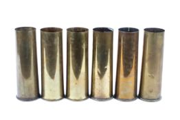 Six WWI and later shell cases.