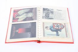 A large collection of mainly German Third Reich period postcards and ephemera in a single red-bound