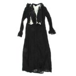 A 20th century ladies black Chantilly lace dress.