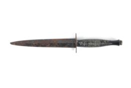 A commando dagger of Fairbairn Skyes type.